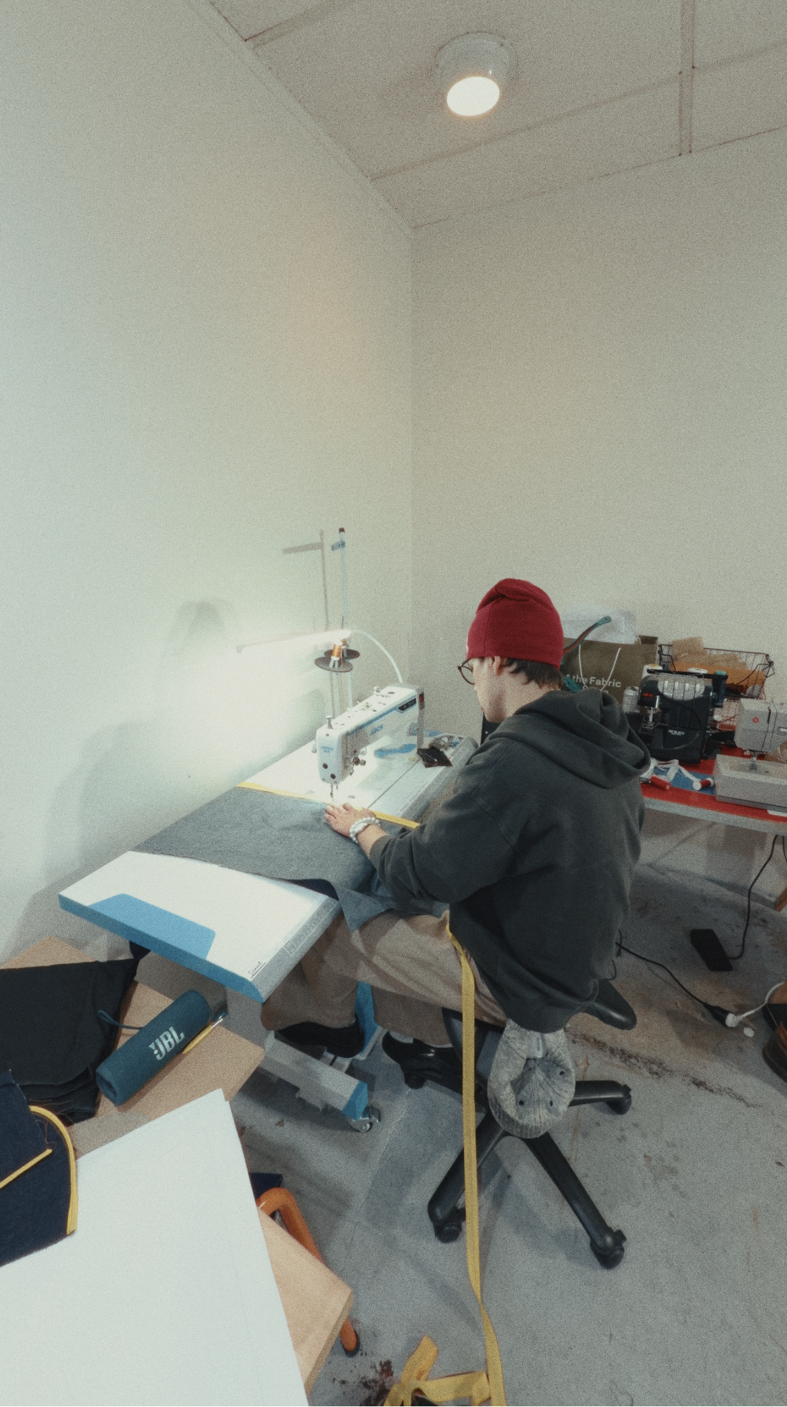 Callum Godfrey sewing bespoke denim